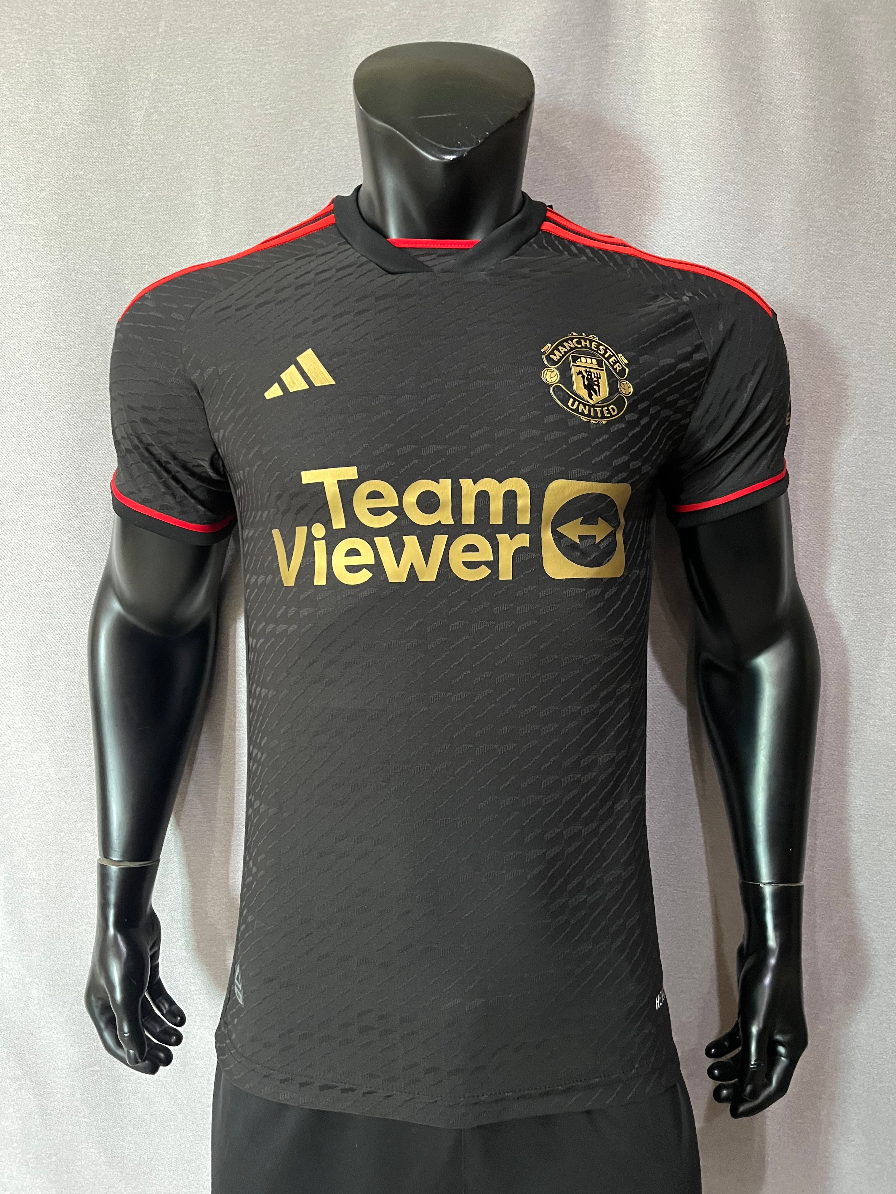 Manchester united black sales and gold